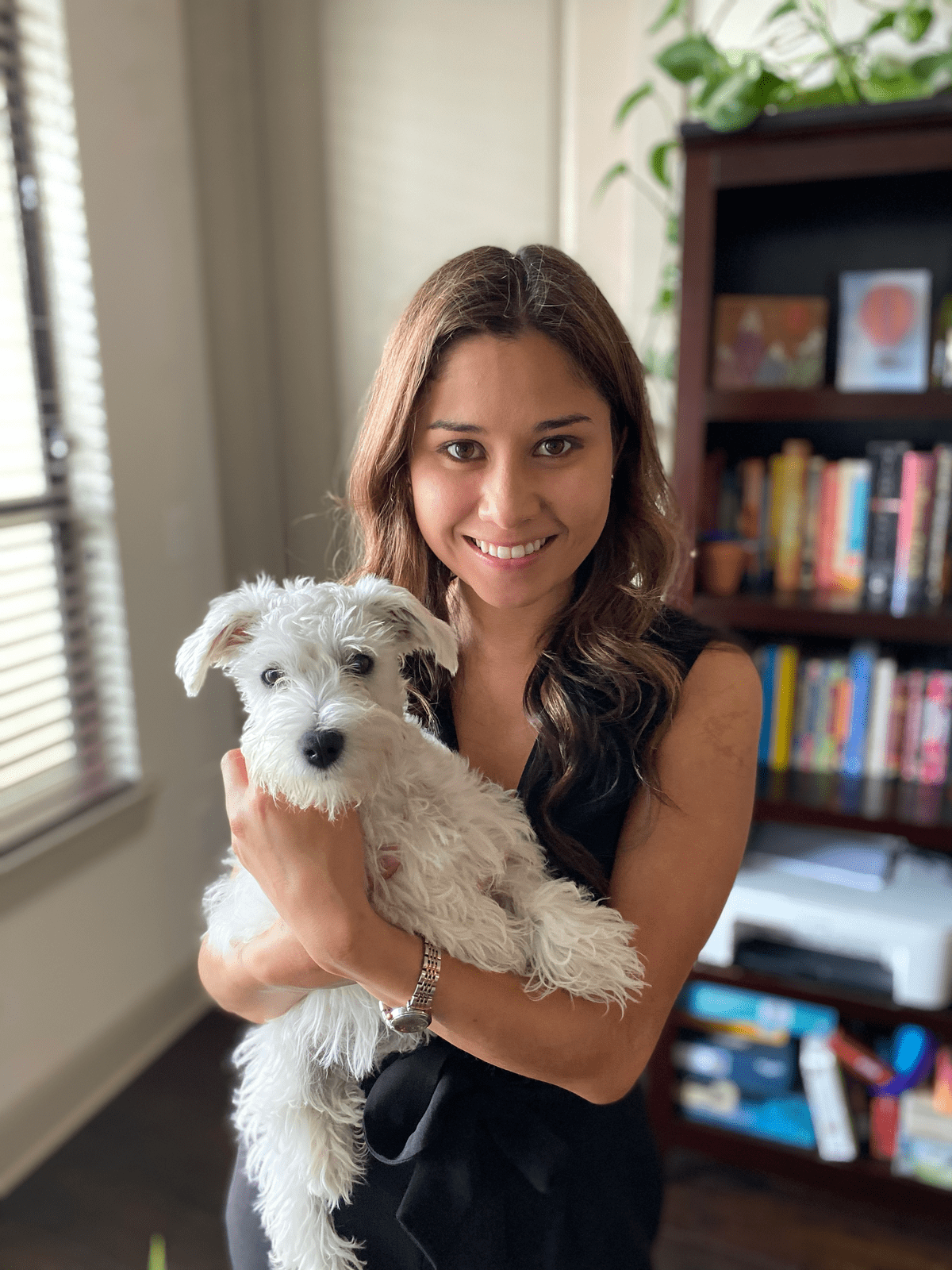 Katrina holding Charlie, the white schnauzer puppy